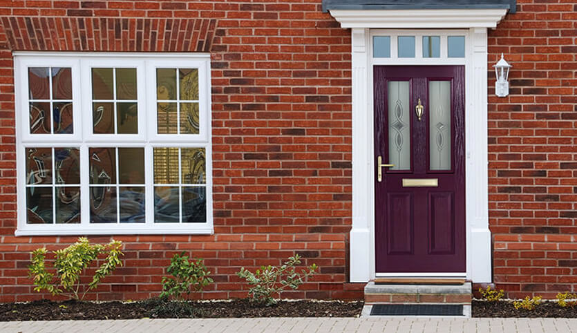 Purple composite front door installation