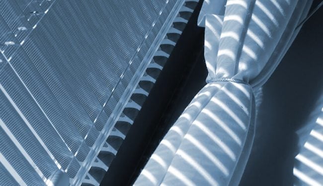 Styling Your Conservatory with Blinds or Curtains