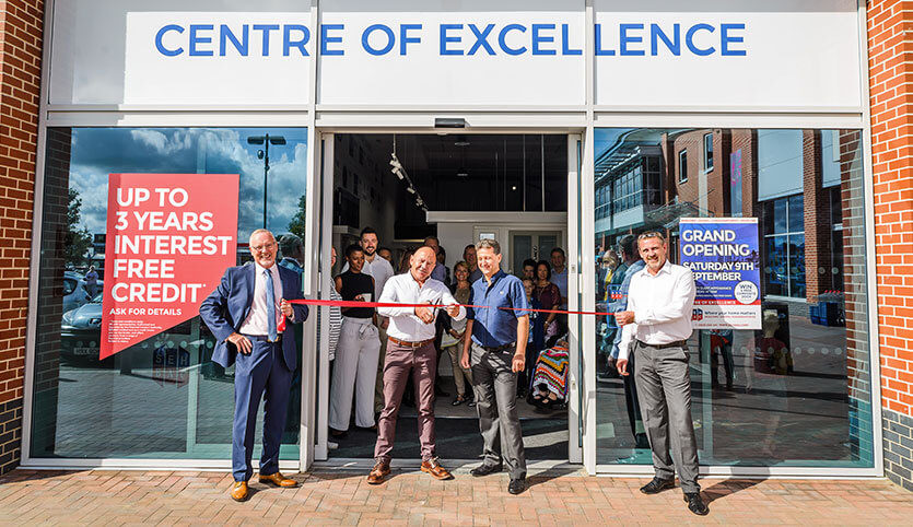 Dominic Littlewood cutting the ribbon at the new Colchester showroom