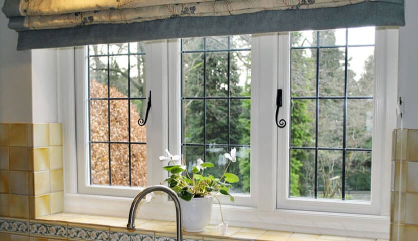 Interior view of a uPVC window with traditional heritage handles