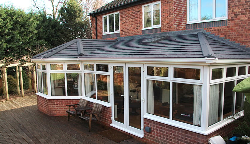 P Shaped conservatory with a tiled roof