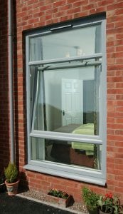 Grey uPVC tilt and turn windows