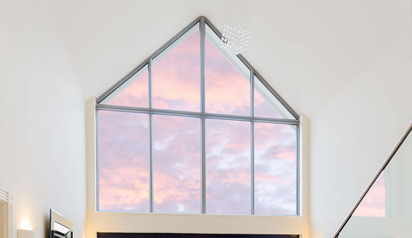 Bespoke aluminium windows in triangle shape arrangement
