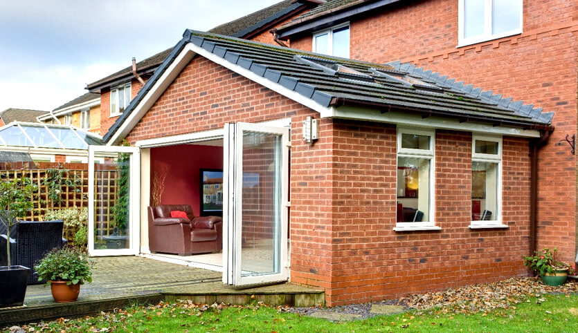 Red brick extension with a tiled roof