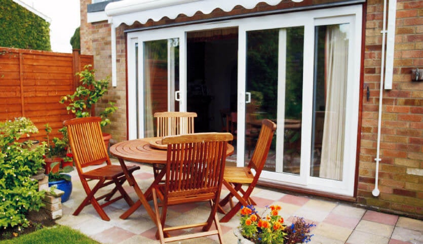 An open white uPVC sliding patio door