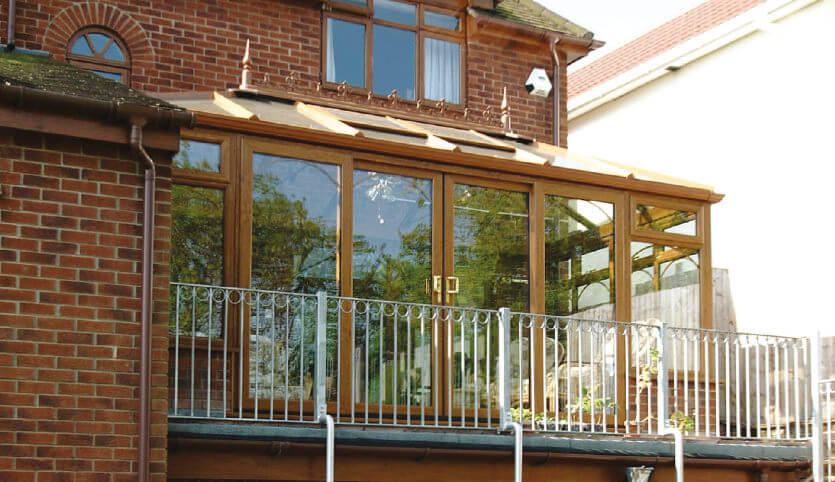 Golden oak effect uPVC Edwardian conservatory