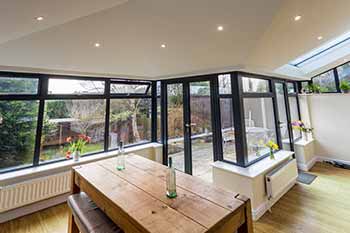 Solid roof conservatory with black frames