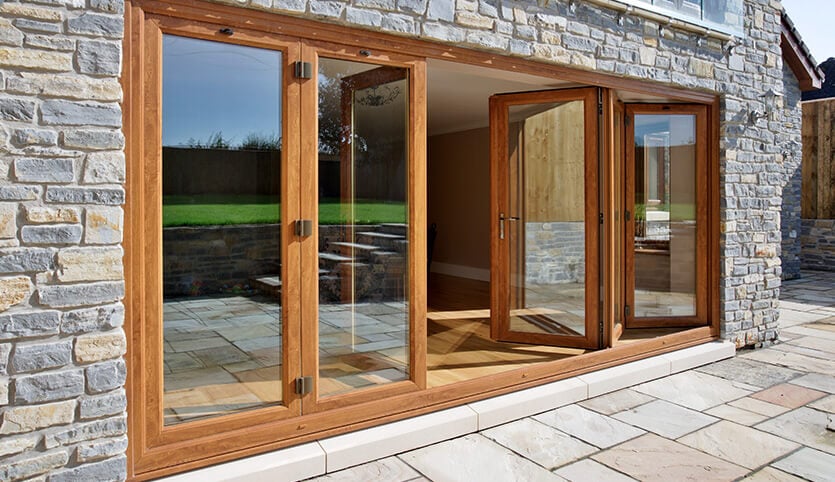 Eurocell oak effect bifold door installed in Colchester.