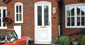 Front door with numerals, handle and letterplate