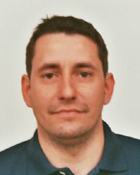 It's a passport photo of Dave Fowler.