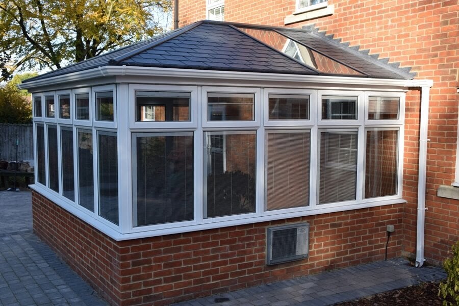 A grey tiled roof conservatory.