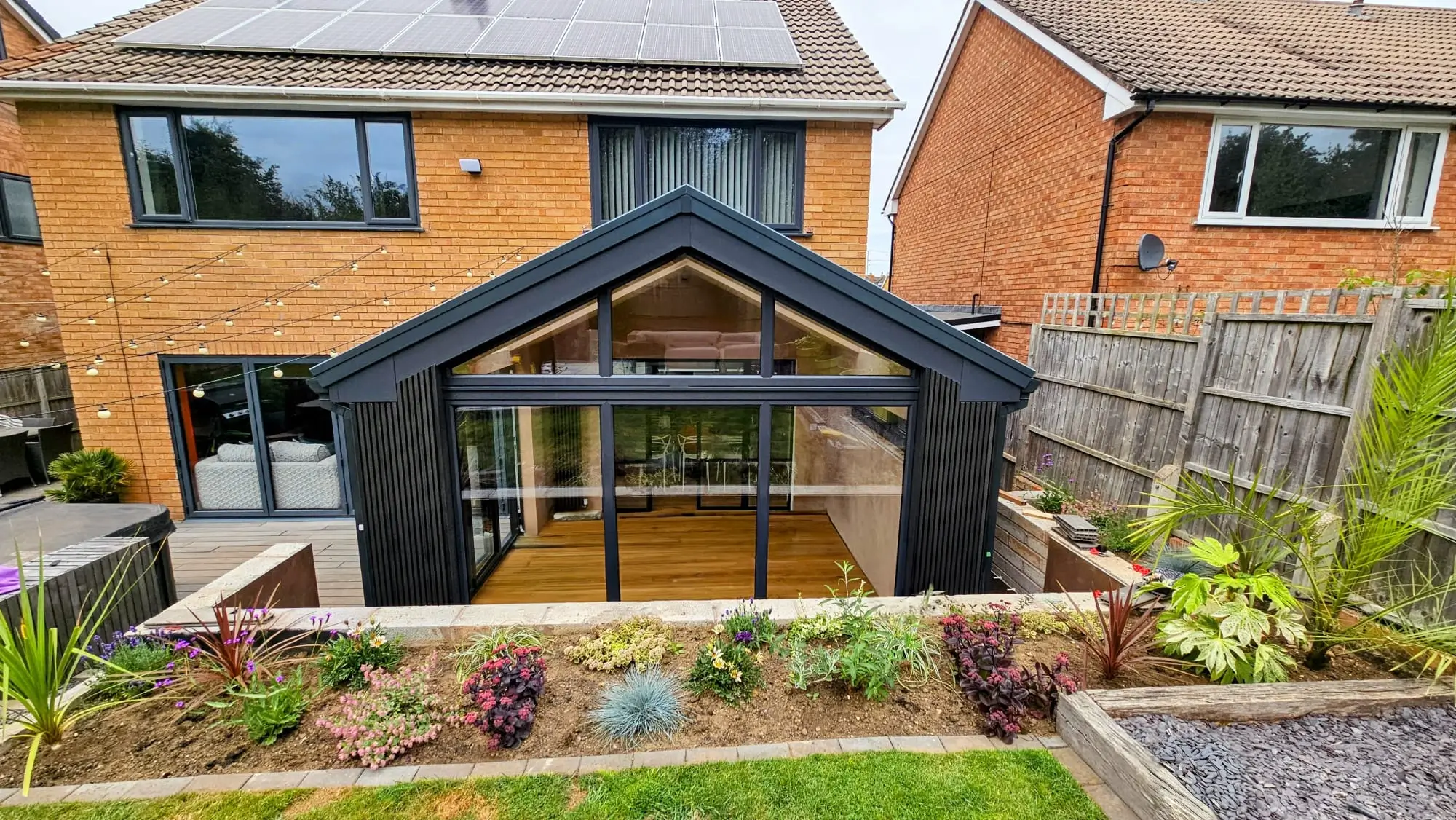 Modern conservatory in a modern garden